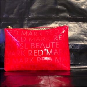 Yves Saint Laurent red cosmetic bag